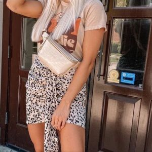 Wrap over animal print mini skirt